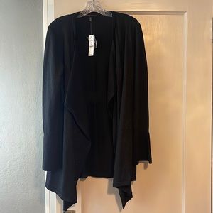 White House Black Market black cardigan with silver thread accent. Size small.